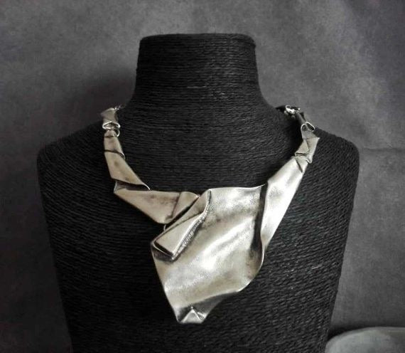 Amea Executive Twist – Sculptural Metal Tie Necklace